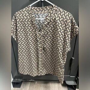 Women’s dress blouse. Rayon fabric.